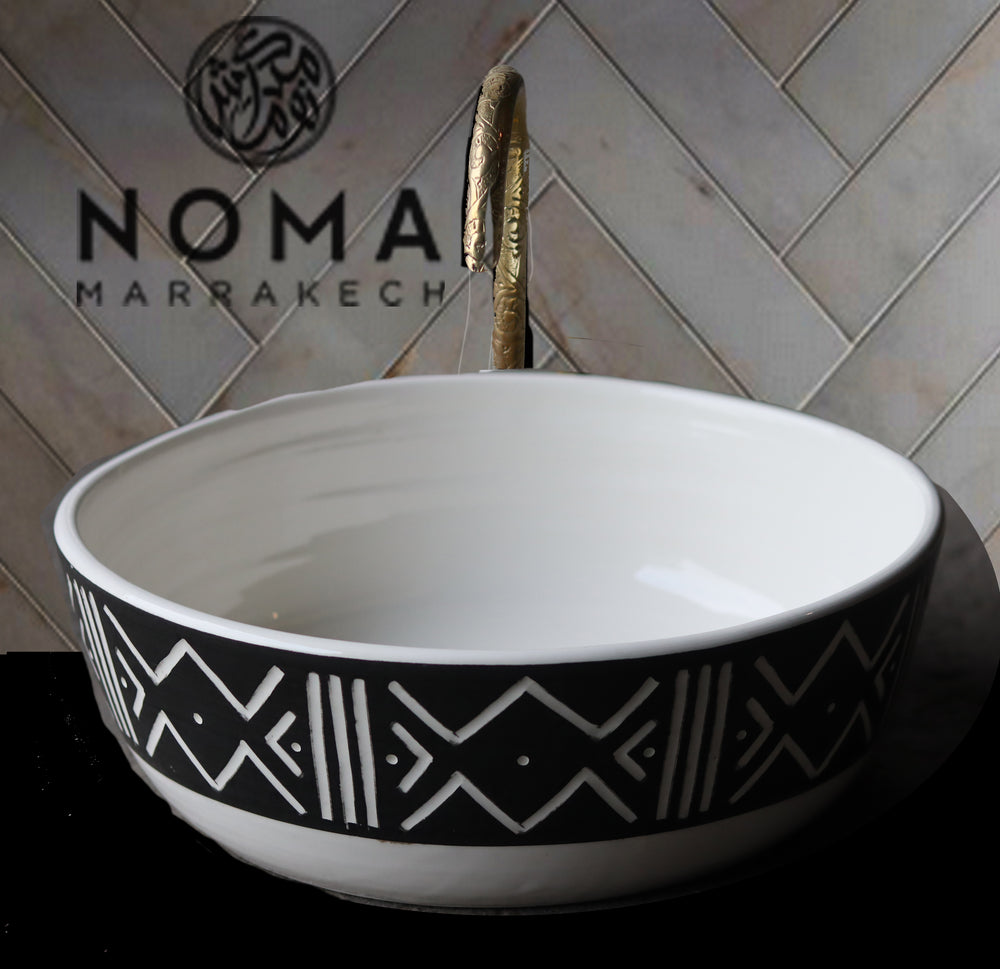 Pedestal ceramic sink in a simple pattern