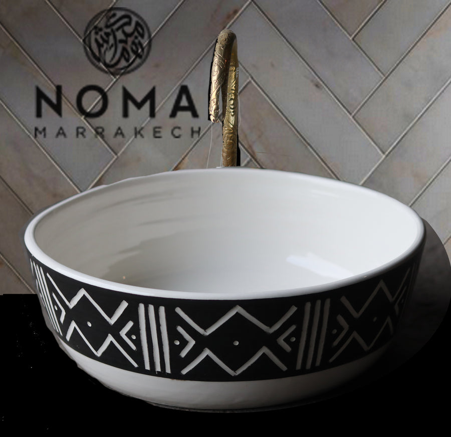 Pedestal ceramic sink in a simple pattern